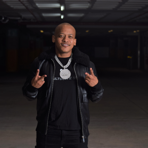 Early B Afrikaans hip-hop star rapping on stage